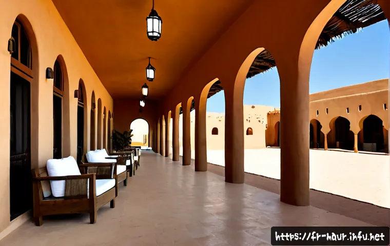 모리타니 숙소 추천 - Photorealistic boutique desert hotel in Nouakchott, Mauritania, elegant sand-colored adobe architect...